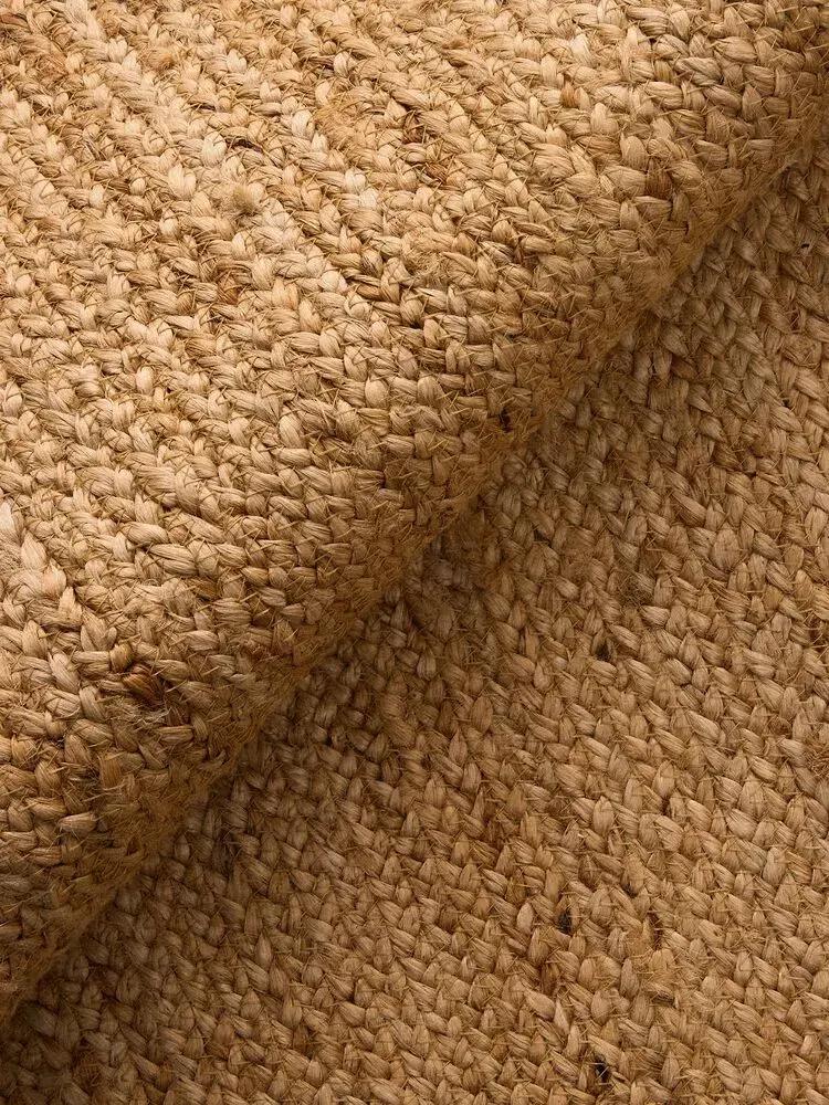 Close-up van een natuurlijk geweven vloerkleed
