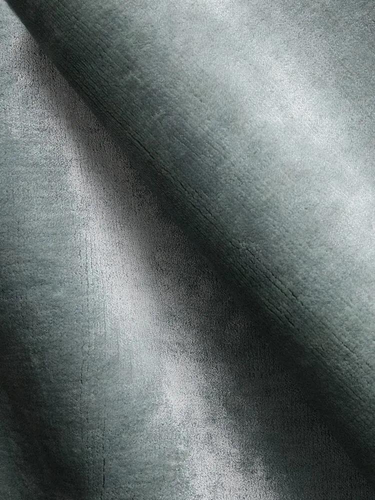 Close-up van een glanzend viscose vloerkleed